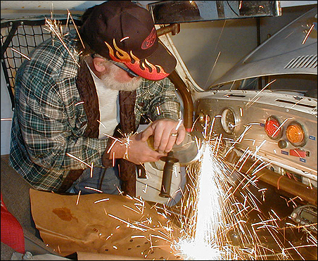 Richard works on making our steering situation legal for SNORE and the Mint 400